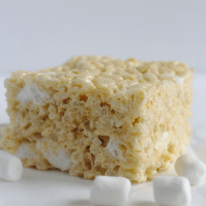 A Rice Krispie square surrounded by marshmallows.