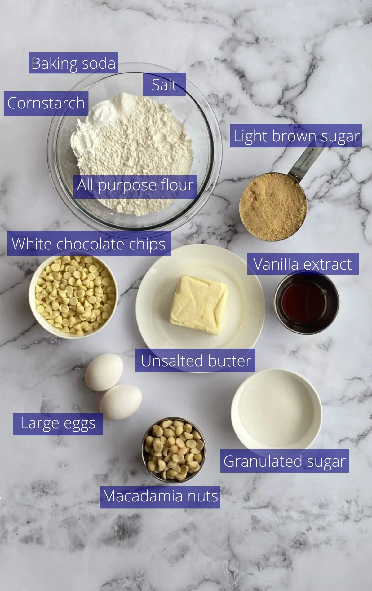 Ingredients needed to make white chocolate macadamia nut cookies.