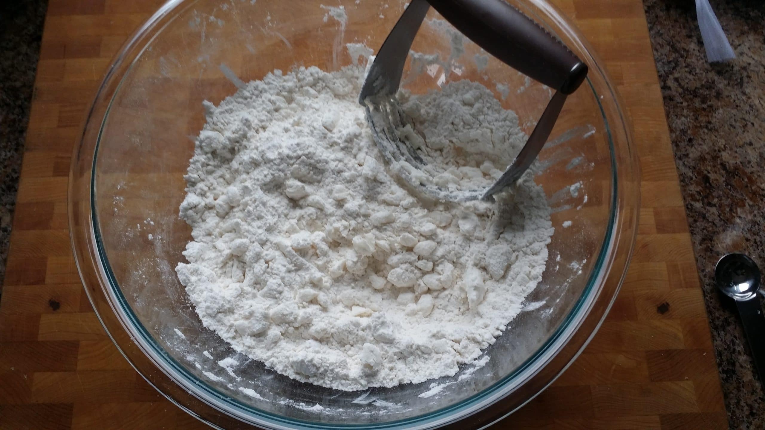 shortening that has been cut into the flour mixture.