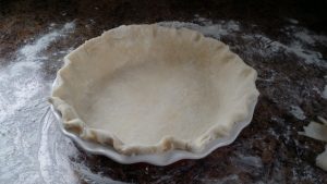 pie dough with fluted eges.
