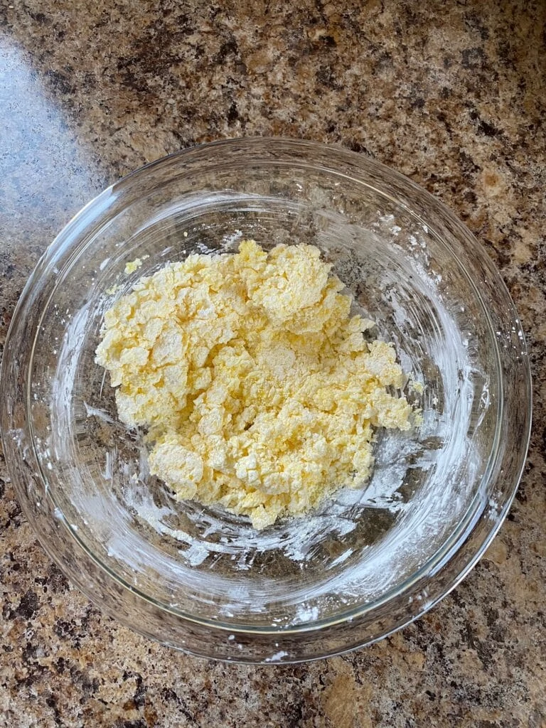 Egg yolks and cornstarch in a bowl.