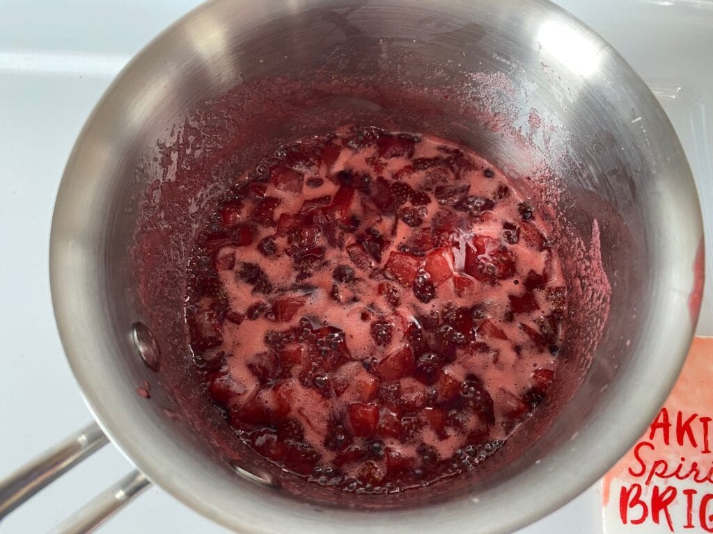 Cook the strawberries, sugar and lemon juice to a gentle boil.