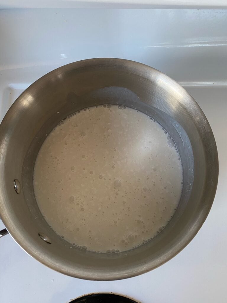 Coconut milk, whole milk, sugar and salt in a saucepan.