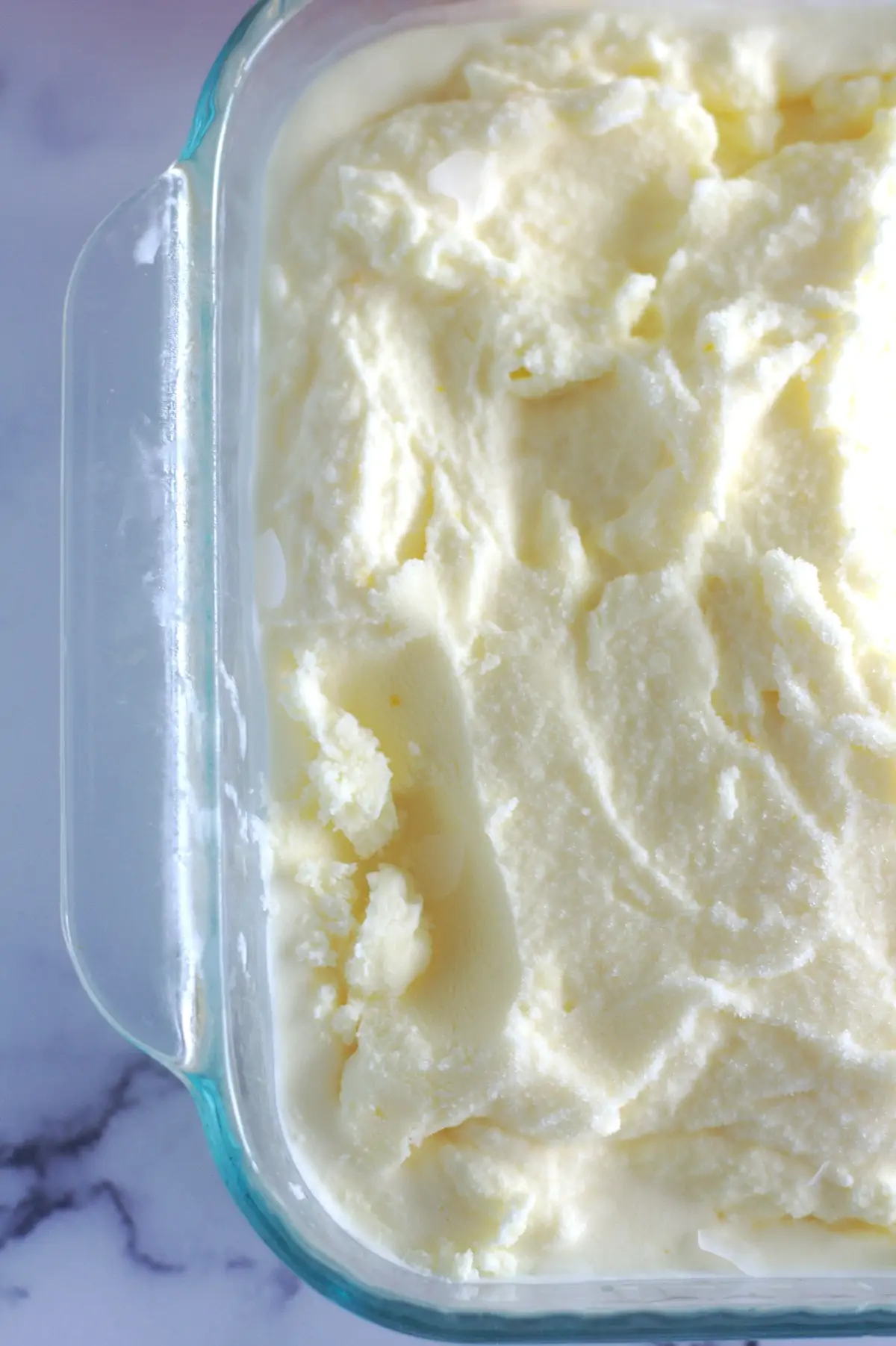 An above view of sherbet in a container.