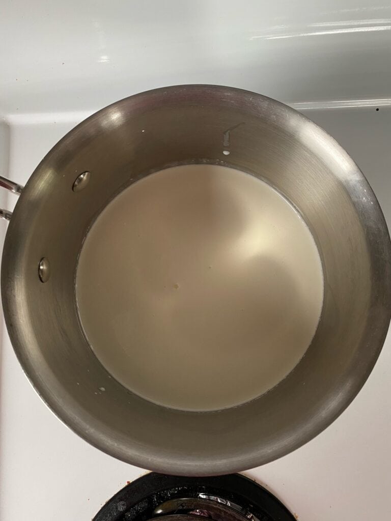Milk, heavy whipping cream, sugar and salt in a saucepan.