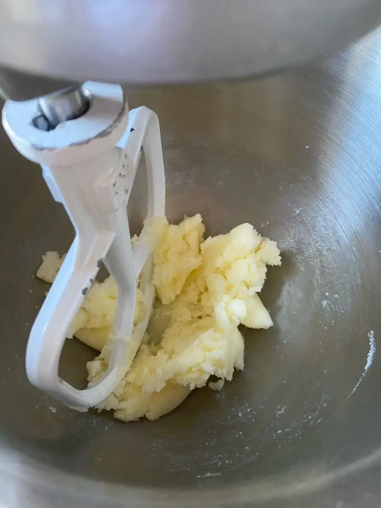 Butter and sugar in a mixing bowl with the paddle attachement.
