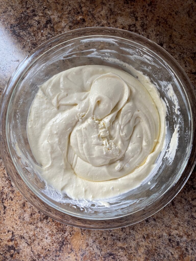 Egg whites gently folded into the mascarpone cheese/egg yolk mixture.