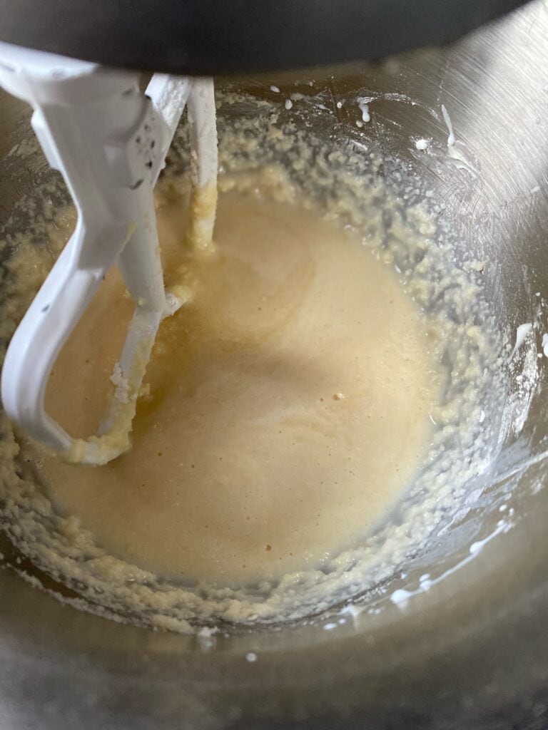 Milk mixed into mixing bowl.