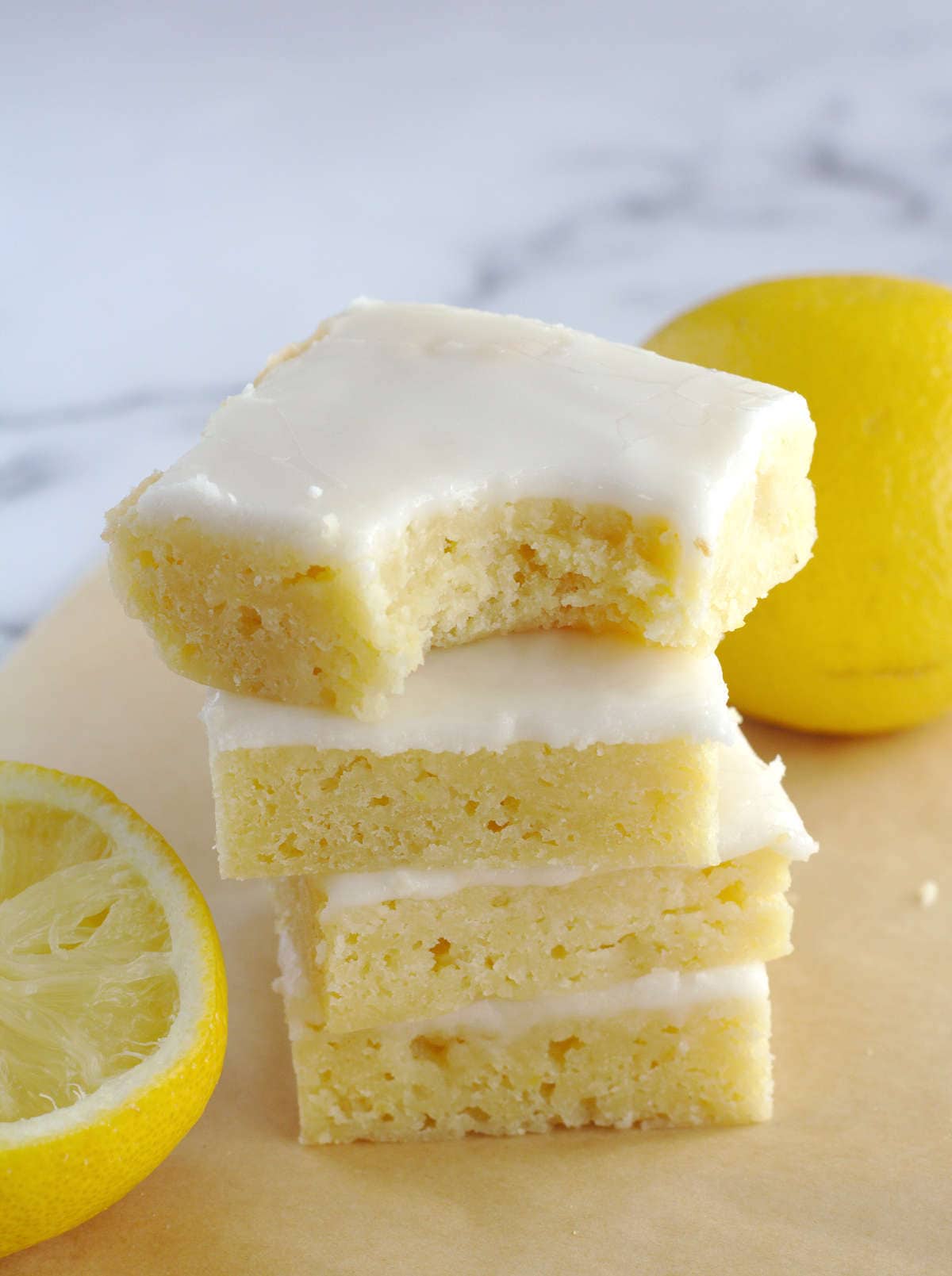 Fudgy Lemon Brownies with glaze Nina Kneads to Bake