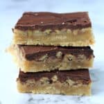 A stack of three bars, one on top of each other.