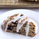 A scone on a white plate.