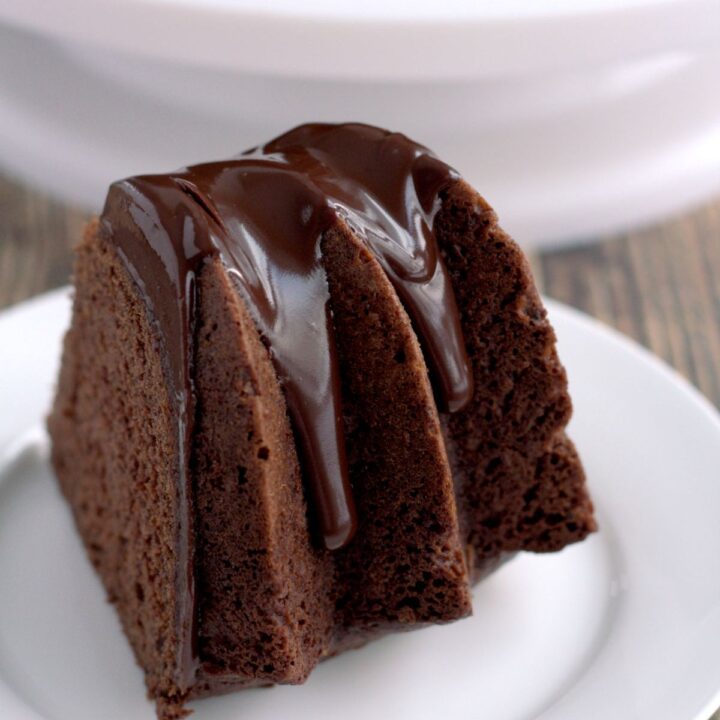 A slice of Bundt cake on a white plate.
