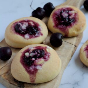 A close up of a kolache. The rest of them are in the background.