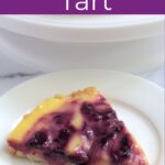 A slice of tart on a white plate.